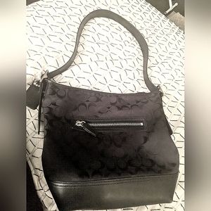 VINTAGE COACH BLACK CANVAS BUCKET DUFFLE SHOULDER BAG.